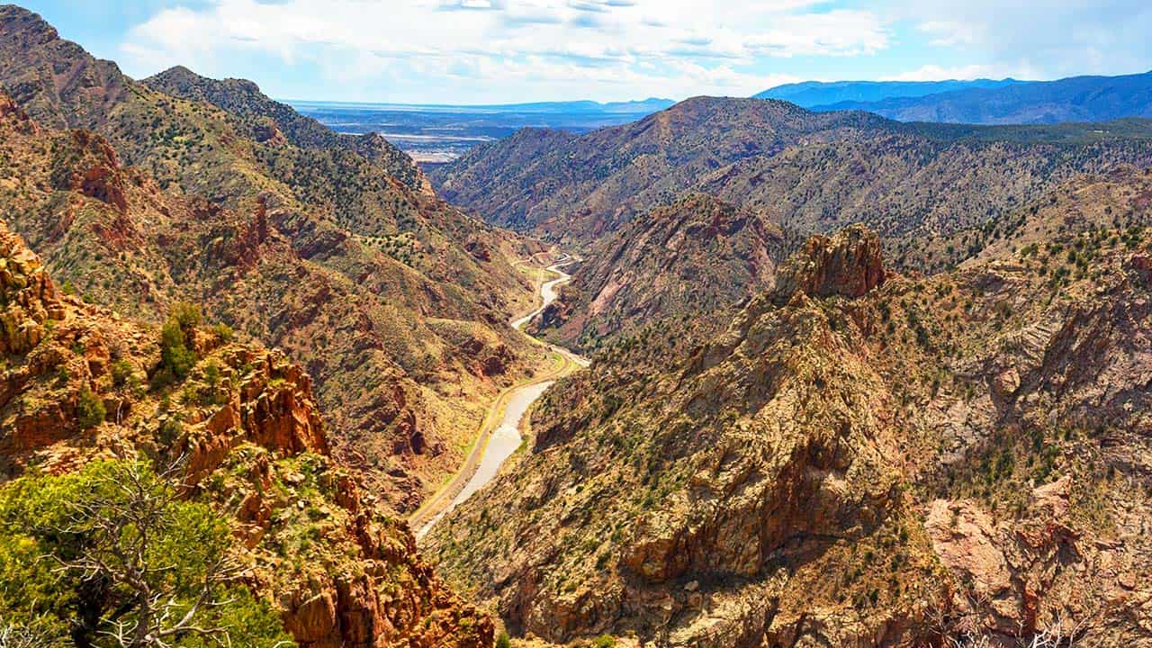 The Royal Gorge canyon with the Arkansas River winding between rocky walls
